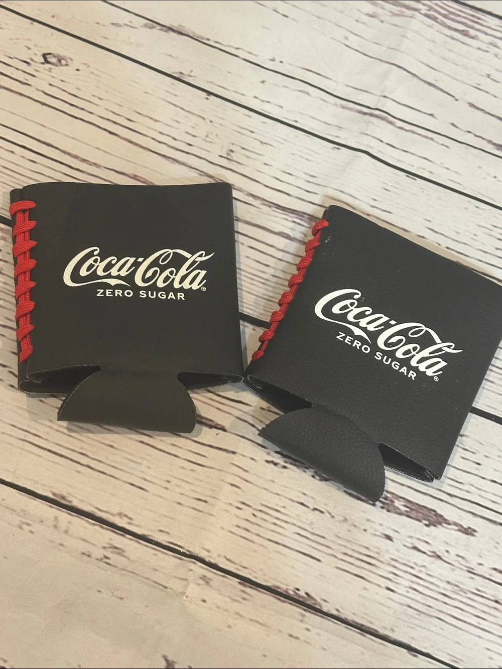 Coca Cola Black Can Cooler with Red Football Lace-up Detail